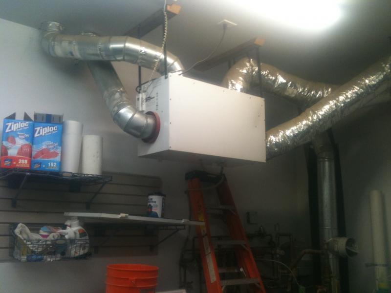 How are they supposed to service this one???  The access door faces the wall.