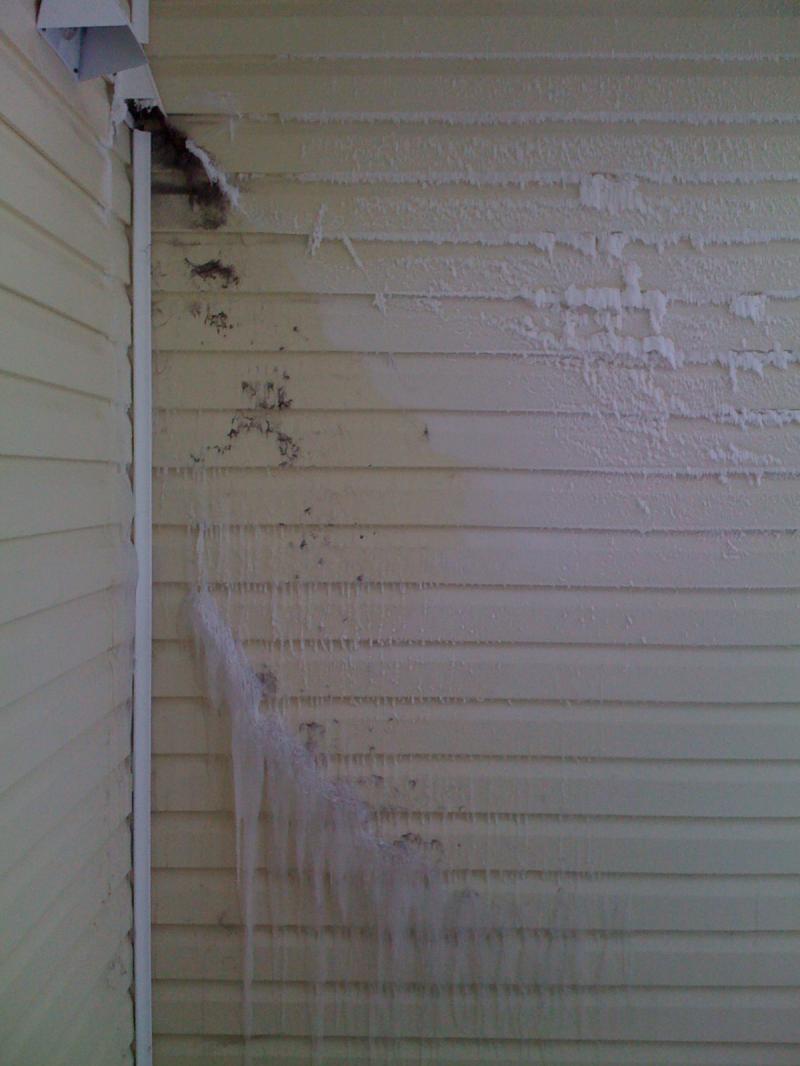 The dryer exhaust hood is tight to the wall, creating a giant lintcicle