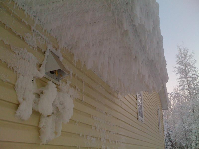 Do not locate exhaust vents under the eaves
